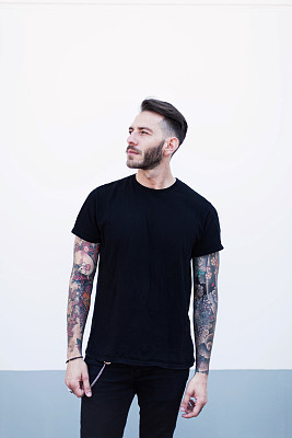 Portrait young man with dark cloth