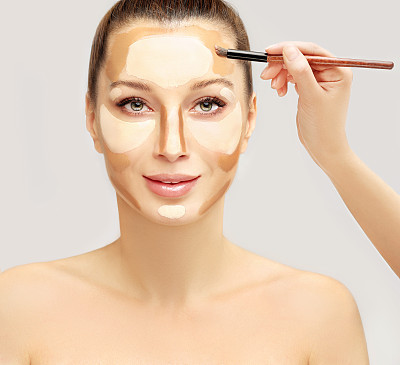Make up woman face. Contour and highlight makeup.
