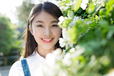 outdoors portrait of beautiful young brunette girl.