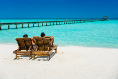 Couple enjoying holidays at Dhiffushi Holiday island, Maldives