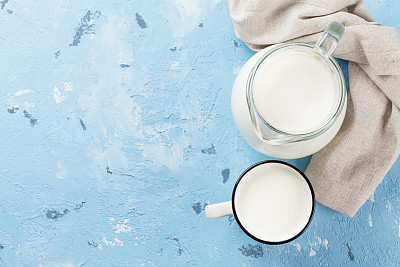 Milk jug and cup