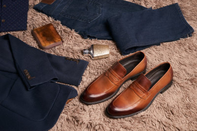 Set of men's clothes such as dark suit jacket