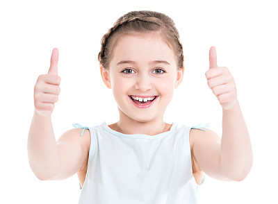 Portrait of a pretty girl showing thumbs up