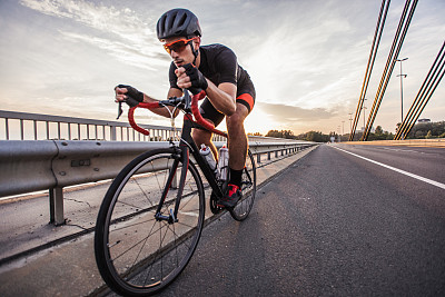 Man riding racing bicycle