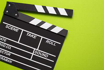 movie clapper on green background
