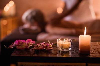 Close up of candles and flowers at the spa.