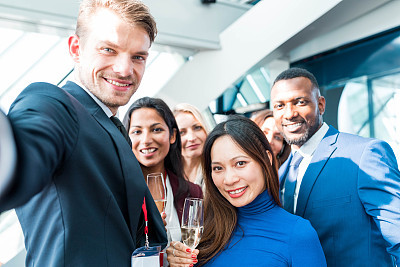 Group of business people taking a selfie