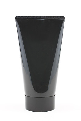 Close-up shot of a black tube isolated on a white background