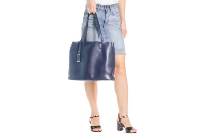 Legs in shoes young girl bag