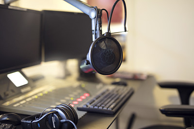 Microphone in radio station broadcasting studio in the morning