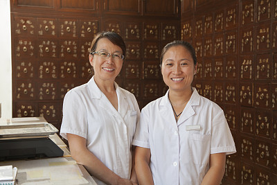 Chinese women in traditional pharmacy