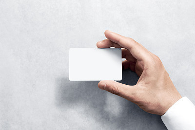 Hand hold blank white card mockup with rounded corners