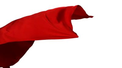 Red fabric flowing on white background, Slow Motion