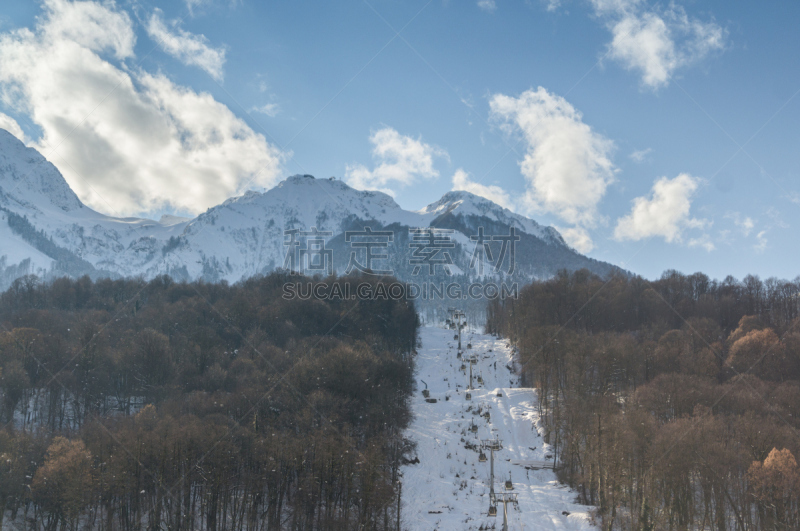 Panoramic view of cable car and mountains  in ski resort Krasnaya Polyana, Sochi, Russia.