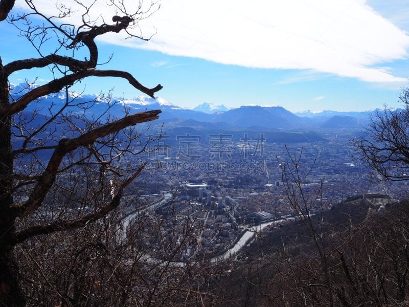 Grenoble, France – March 12, 2019: photography showing the Alps mountain and the villages surrounding the city of Grenoble, France. The photography was taken in the city of Grenoble, France.