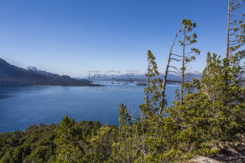 Beautiful panorama with view over the lake. Hiking adventure in San Carlos de Barilochein close to Río Negro, Argentina. Beautiful landscapes around the shores of Nahuel Huapi Lake and National Park with glacier.