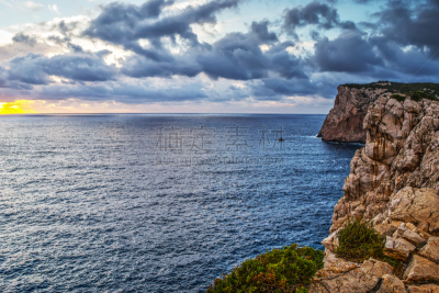 cloudy sky over Capo Caccia coastline