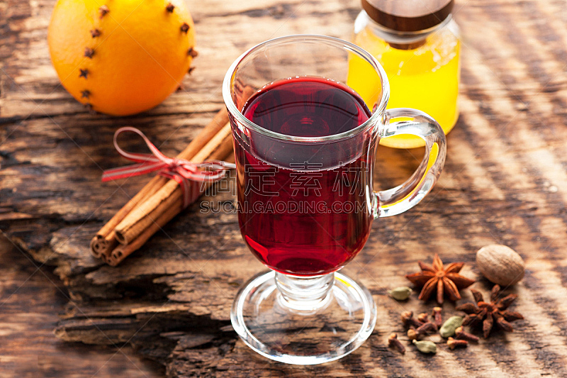 Christmas mulled wine on a wooden background. horizontal