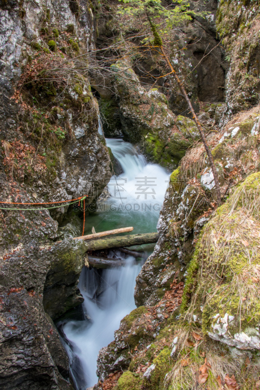 cascade with ropes for canyoneering