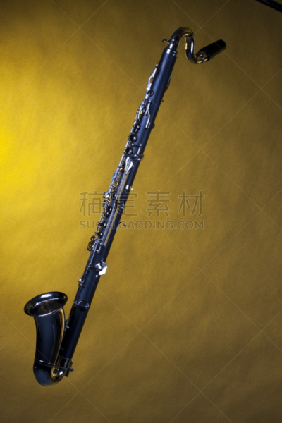 低音单簧管,黄色,分离着色,垂直画幅,留白,无人,背景分离,概念,哨嘴,木管乐器