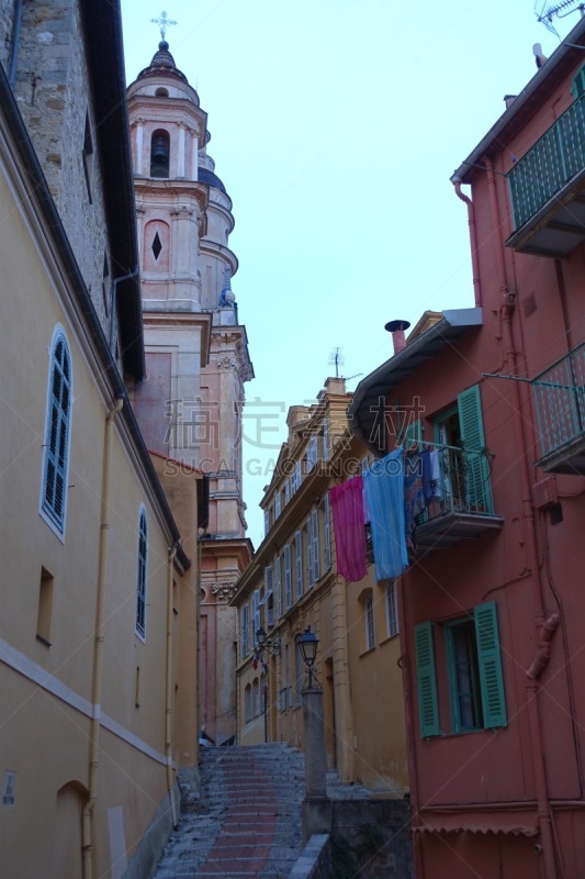 Menton’s old town is a cascade of pastel-colored buildings.