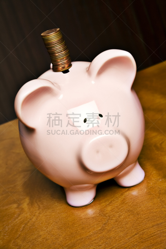 救球,放好,垂直画幅,小猪扑满,储蓄,无人,金融,银行帐户,幽默,彩色图片
