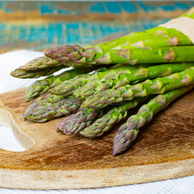 Green young asparagus shoots â premium healtry food, ready to cook and for grill