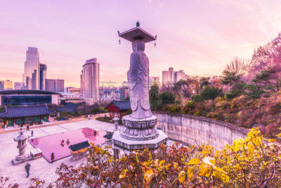 Sunset at Bongeunsa temple of downtown skyline in Seoul City, South Korea