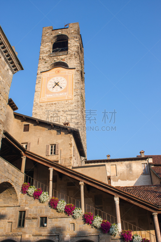 Bergamo - Old city (Città Alta). Landscape on the the ancient Administration Headquarter called Palazzo della Ragione and the clock tower called Il Campanone