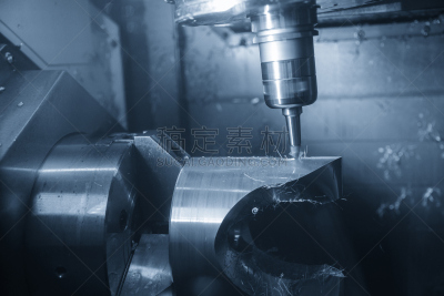 The abstract scene of  5-axis CNC Machining center cutting the turbine  part.