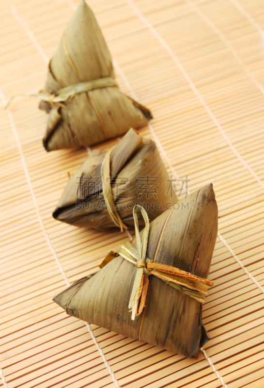 米饺子,龙舟赛,粽子,饺子,垂直画幅,褐色,无人,开胃品,膳食,塞满了的