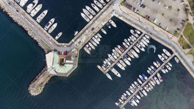 Many boats moored to floating pontoons in Istanbul ,Fenerbahçe.Top view of the large yacht marina. Aerial view by drone