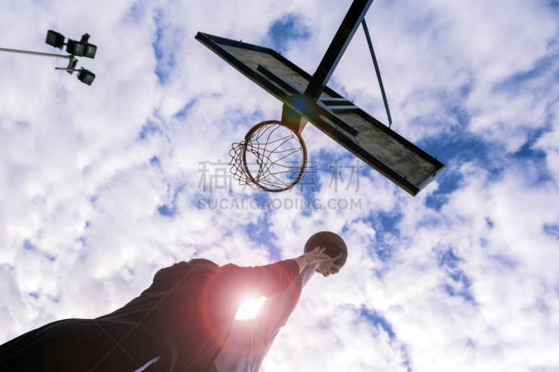 Two basketball players playing a friendly game