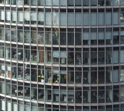 Curved glass facade of a modern office block