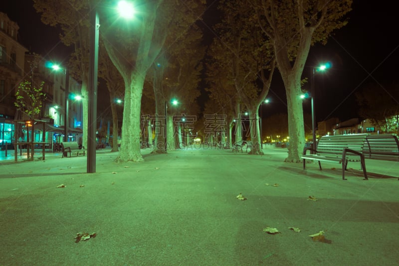 Urban streets, scenes and architecture tree lined promenade Cours de la République, Narbonne, France.