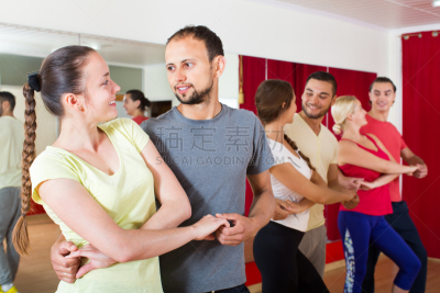 Adults dancing in dance studio