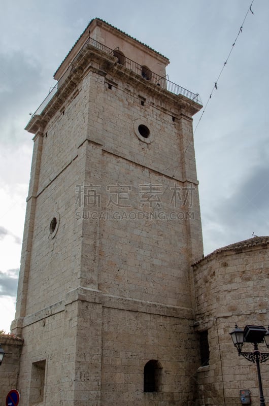 Peñafiel, Valladolid, Spain; April 2015: view of the tower of the church of Santa Maria de Mediavilla, in the medieval village of Peñafiel