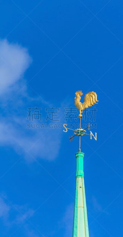 Golden cockerel on spire of  Anglican Church at   Trinity square