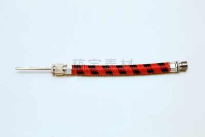 the hose with a needle to inflate the ball
