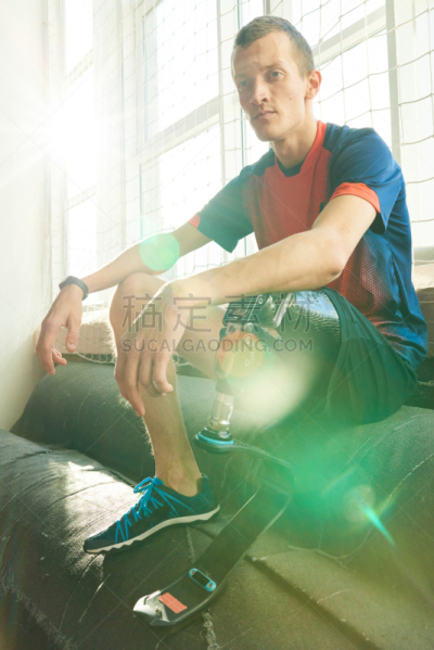 Amputee Sportsman Resting in Sunlight