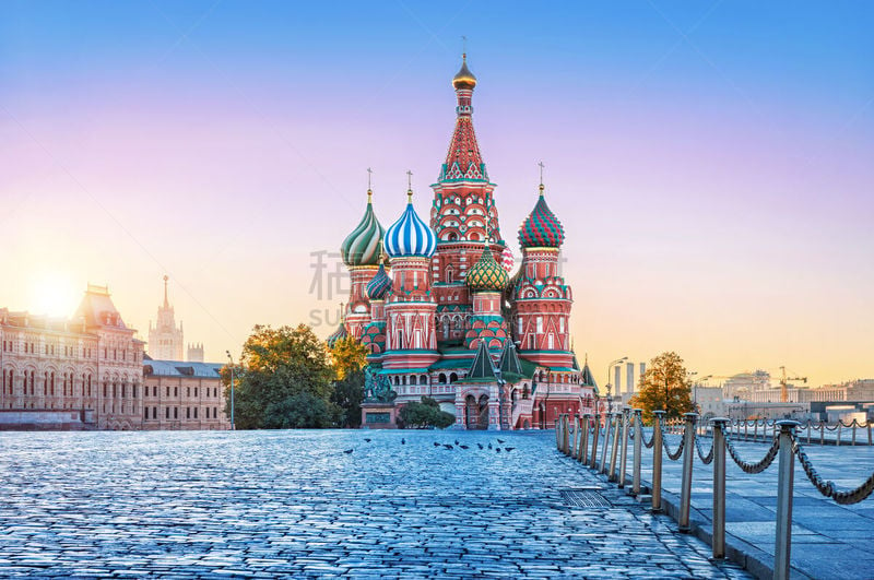 St. Basil’s Cathedral on Red Square in Moscow and pigeons on an early autumn sunny morning