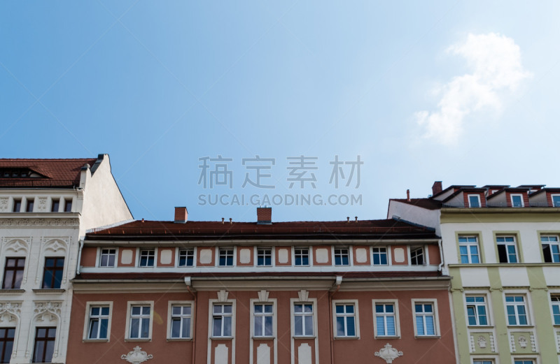 Residential building in closed development and eastern rear building; original shop fronts and windows on the left side, of architectural and historical importance. Located at Obermarkt Square in the historic Old Town of Görlitz, Germany.