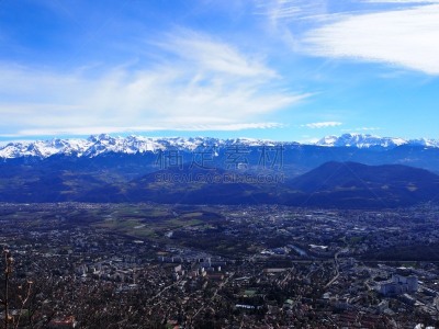 Grenoble, France – March 12, 2019: photography showing the Alps mountain and the villages surrounding the city of Grenoble, France. The photography was taken in the city of Grenoble, France.