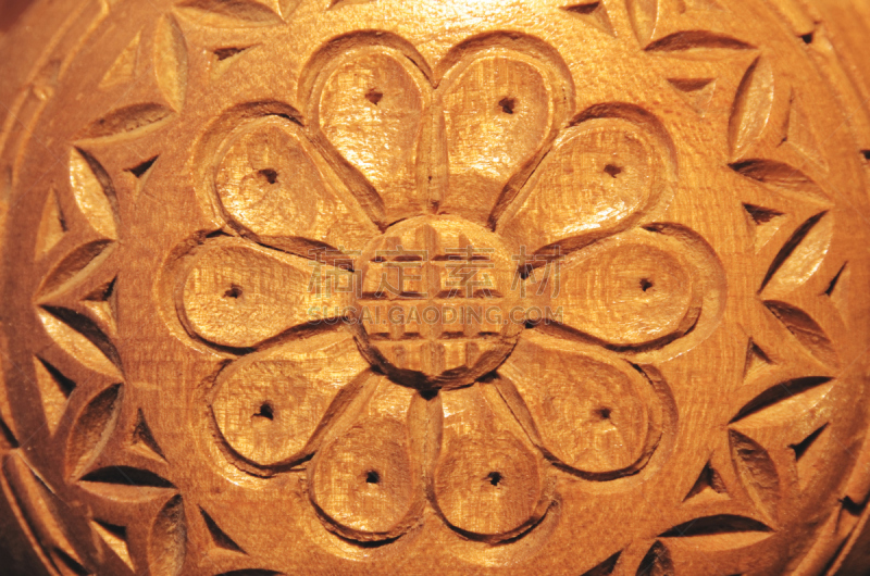 Carved wood flower