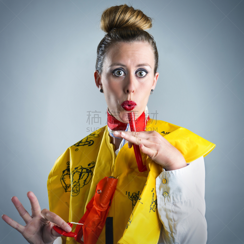 机舱乘务员,空中安全示范,救生衣,美,注视镜头,性格,制服,白人,仅成年人,青年人