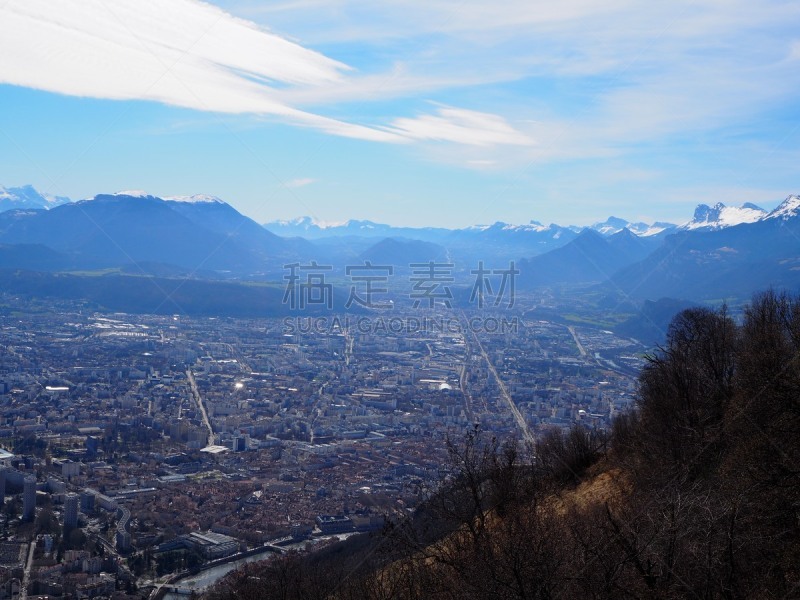 Grenoble, France – March 12, 2019: photography showing the Alps mountain and the villages surrounding the city of Grenoble, France. The photography was taken in the city of Grenoble, France.