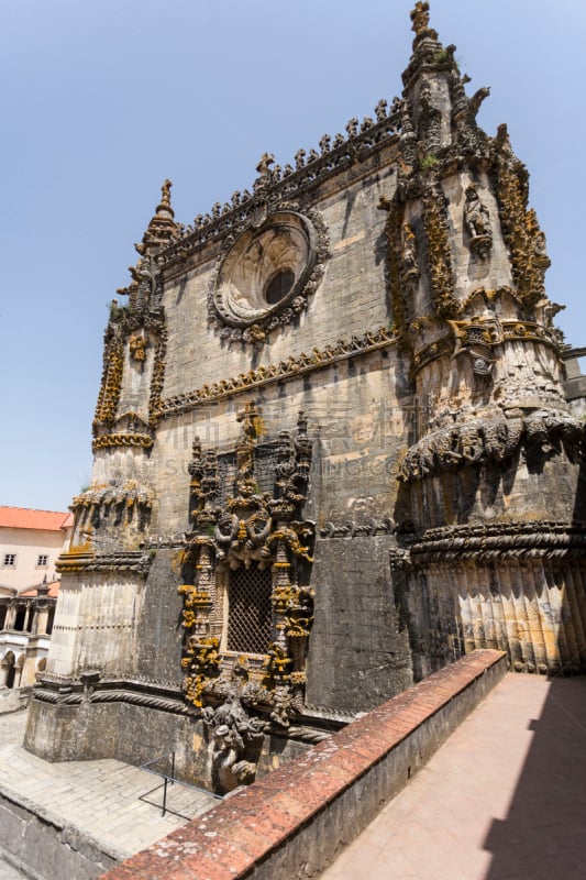 The elaborated western façade and the intricate Manueline window of the church at the Convent of Christ