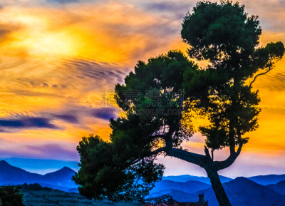 Sunset over the hills surrounding the Pamplona basic. Pamplona (Iruña), the historical capitalof Navarre, Spain, Famous for the running of the bulls during the San Fermin festival brought to literary renown by Ernest Hemingway's novel The Sun Also Rises.
