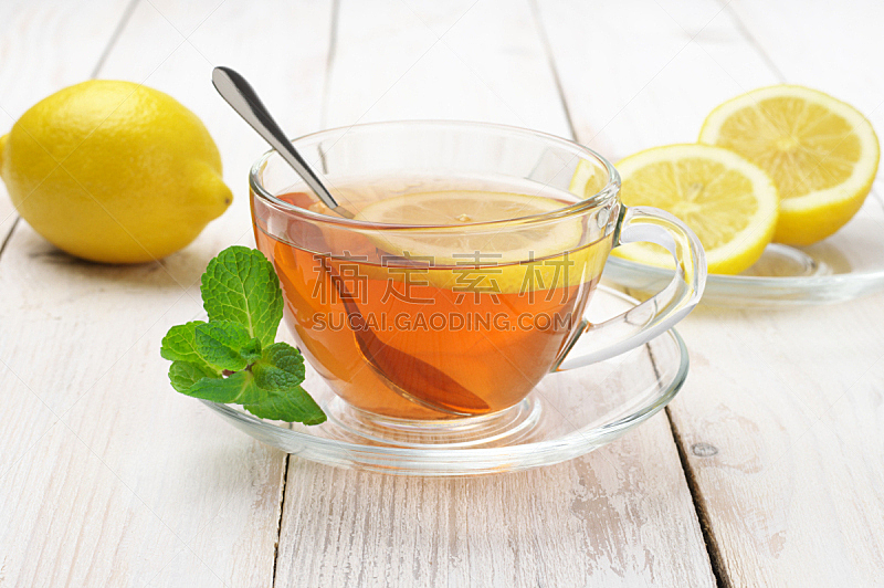 Tea in glass cup with lemon