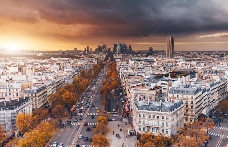 La Defense Financial District Paris France at sunset in autumn. Famous touristic places in Europe. European city travel concept.